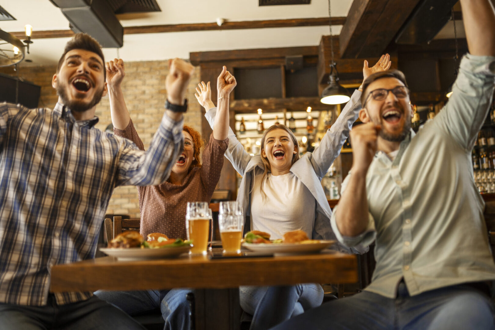 Friends cheering with excitement